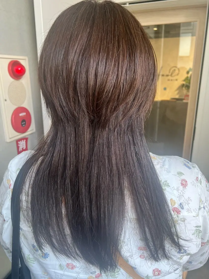 ロング 〆田 幸子のヘアスタイル