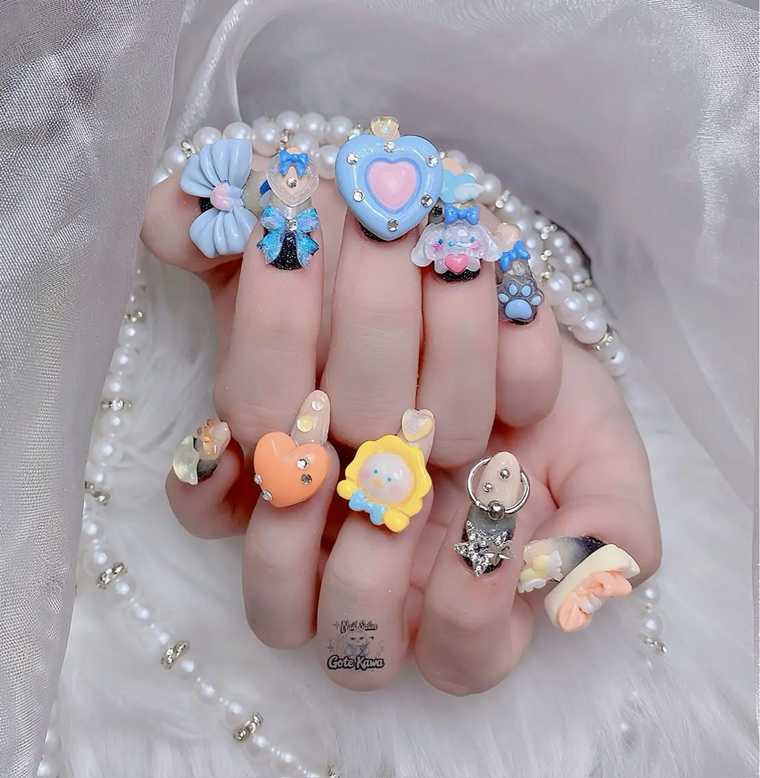 ネイル アートネイル 長さ出し キラキラネイル ピンク リボン ハンドネイル ハンドケア Gote Kawa nail salonのネイルデザイン