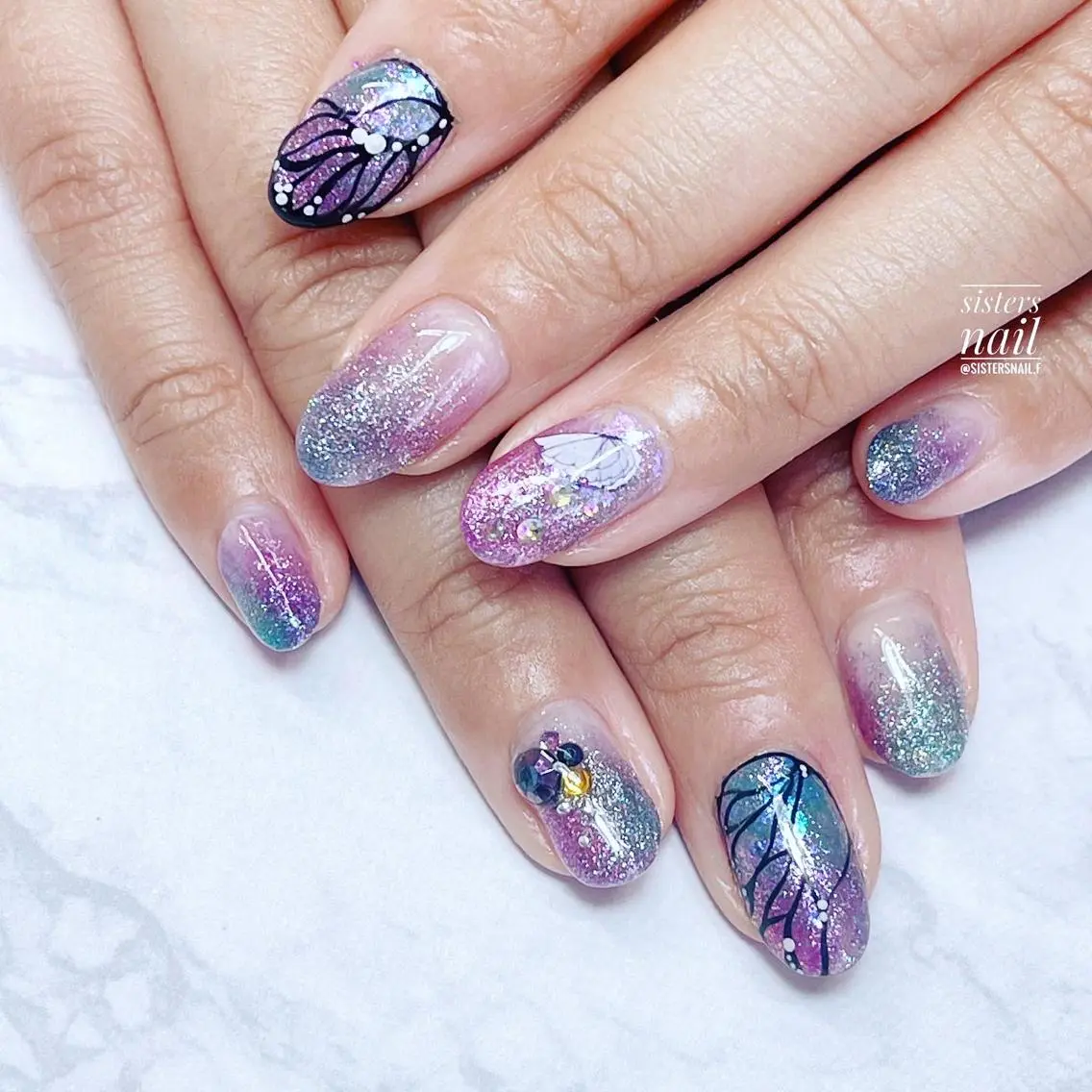ネイル アートネイル ブルー グラデーション キラキラネイル ラメ(グリッター) sisters nail.fのネイルデザイン