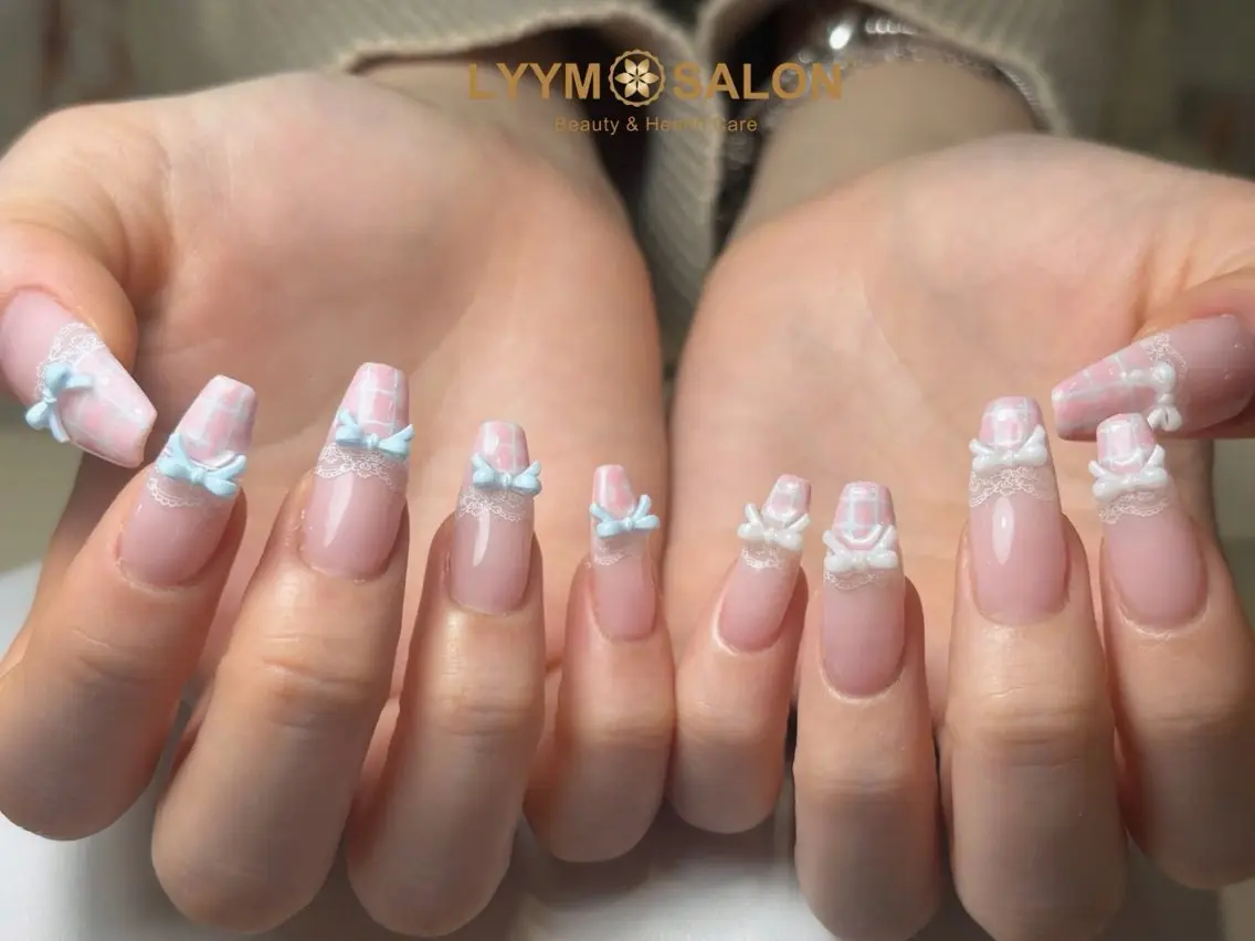 ネイル ガーリー 韓国ネイル リボン ワンホンネイル ハンドネイル LYYM Salonのネイルデザイン