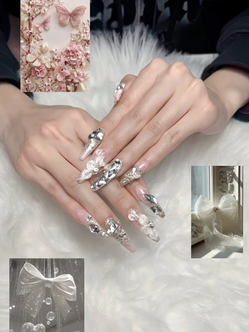 ネイル 桜ネイル フラワーネイル キラキラネイル ラメ(グリッター) ピンク le luxe nailsのネイルデザイン