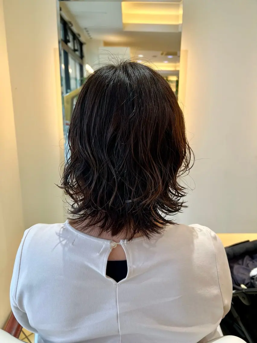 ミディアム パーマ ミディアムパーマ 外ハネヘア スパイラルパーマ 吉澤 杏美のヘアスタイル