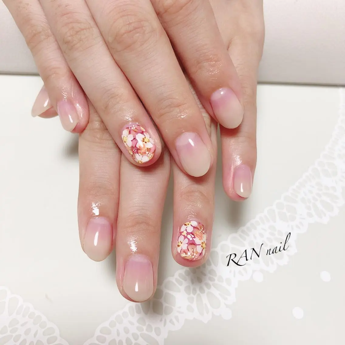 ネイル オーロラネイル フラワーネイル グラデーション オフィスネイル オレンジ ハンドネイル フットネイル RAN nailのネイルデザイン