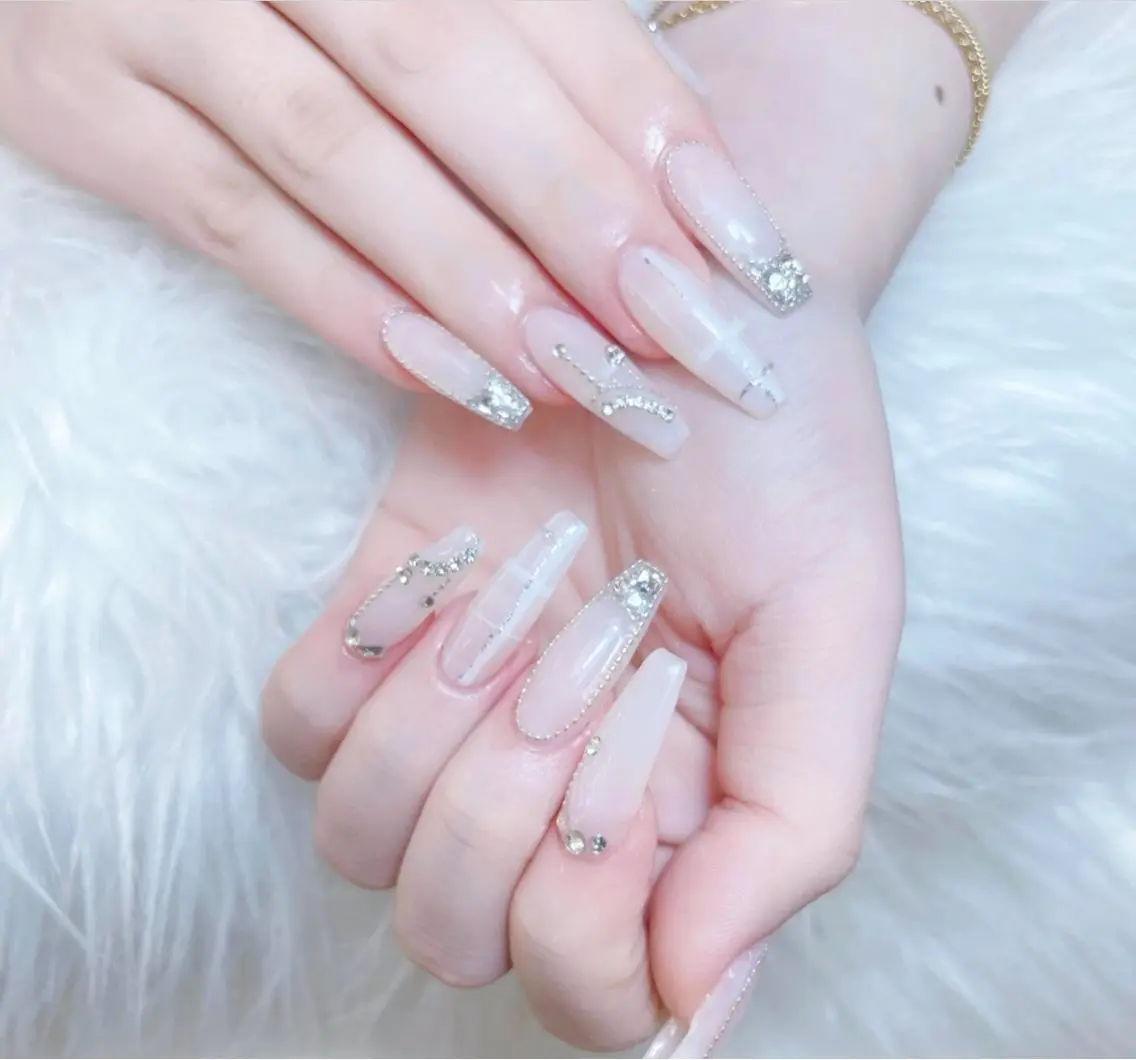 ネイル 成人式 ロングネイル マグネットネイル 大理石ネイル(マーブル) リボン ハンドネイル Amee Nail Salonのネイルデザイン