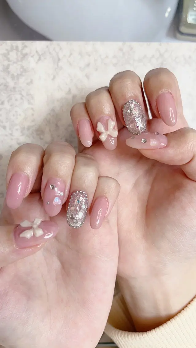 ネイル ワンカラーネイル ピンク リボン ストーンネイル Will nail salonのネイルデザイン