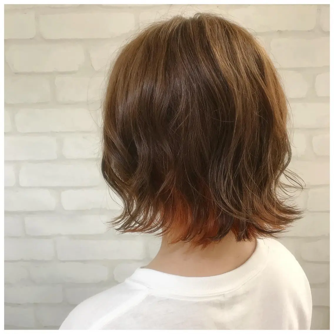 ダメージレスインナーカラー + カットの写真