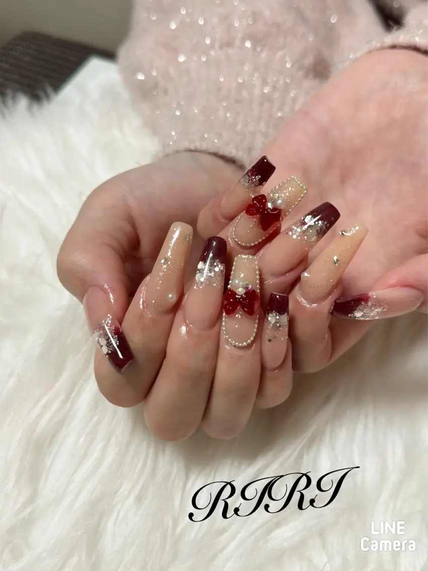ネイル ジェルネイル ロングネイル 赤色 リボン スカルプネイル ハンドネイル riri オーナーのネイルデザイン
