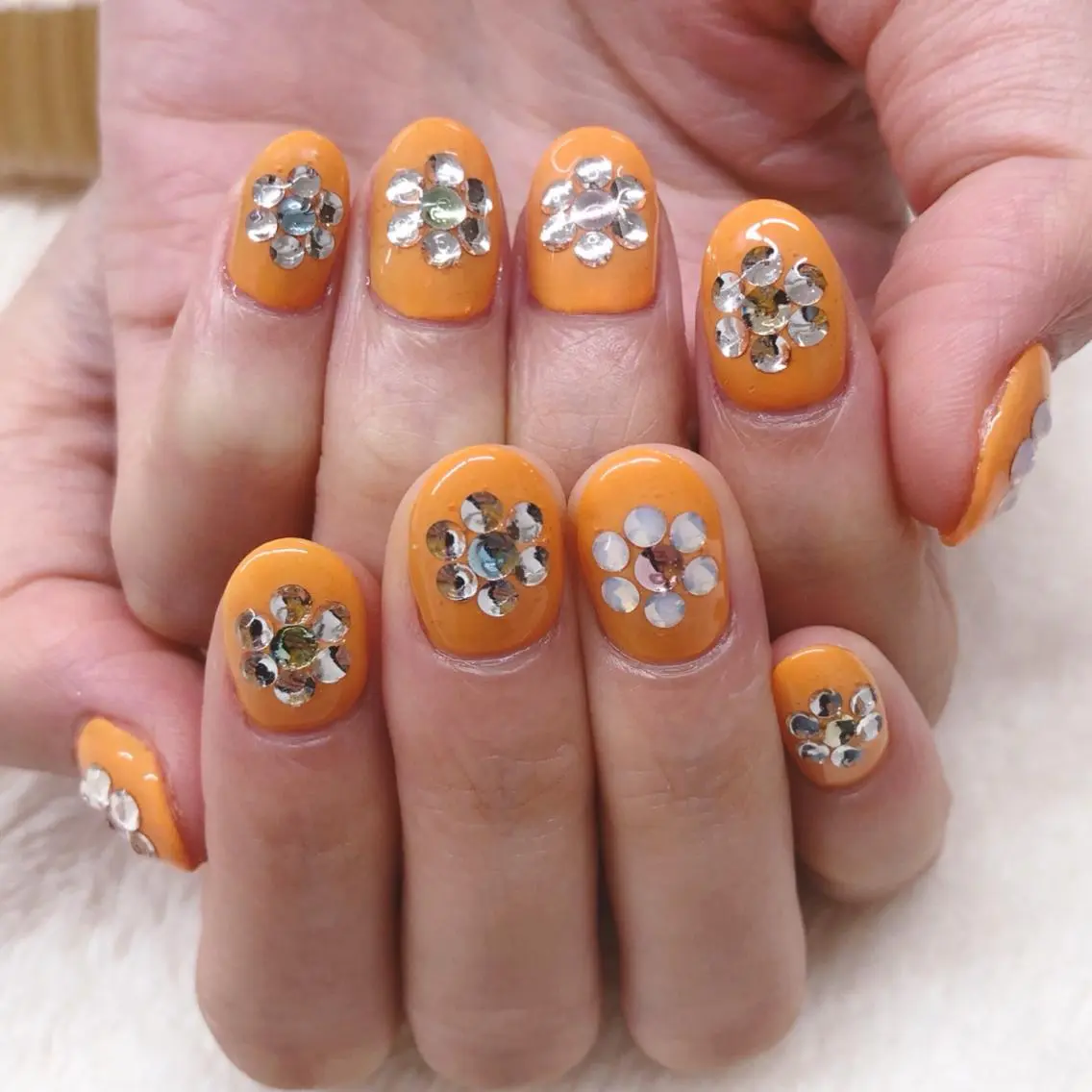 ネイル フラワーネイル オレンジ ストーンネイル ハンドネイル MAYME TAMAKIのネイルデザイン