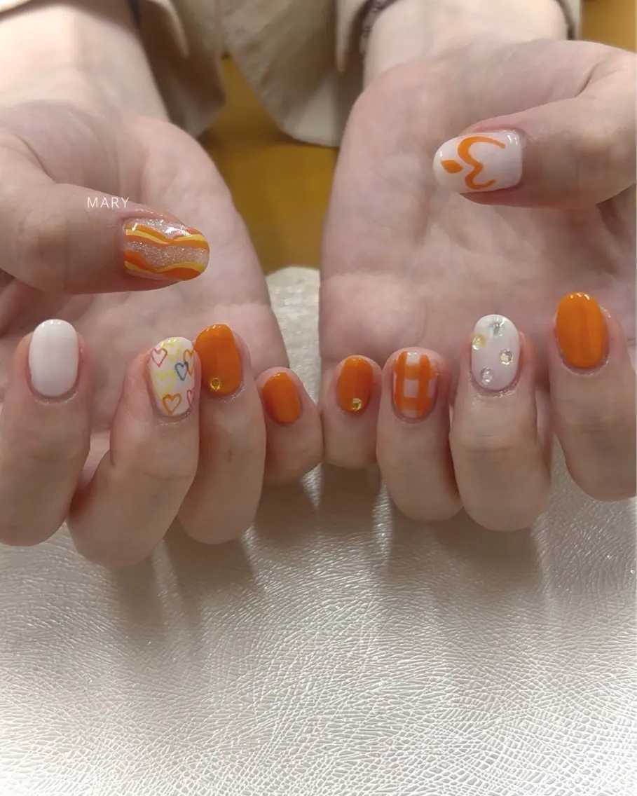 ネイル オレンジ ハンドネイル Mary nail .narumiのネイルデザイン