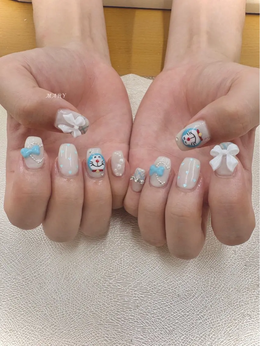ネイル 水色 持ち込み ニュアンスネイル リボン ホワイト ハンドネイル Mary nail .narumiのネイルデザイン