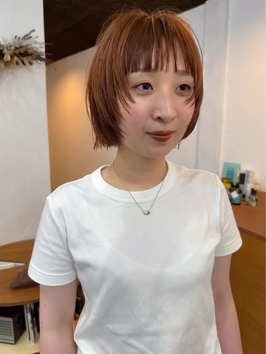 ショート カラー オレンジ ボブ 顔まわりレイヤー レイヤーカット カット ヘアカラー Spiel KOMOのヘアスタイル
