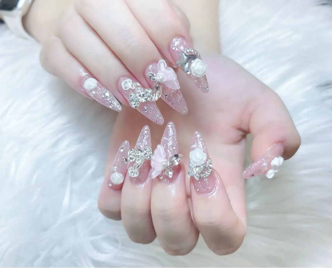 ネイル 成人式 ロングネイル マグネットネイル 大理石ネイル(マーブル) リボン ハンドネイル Amee Nail Salonのネイルデザイン