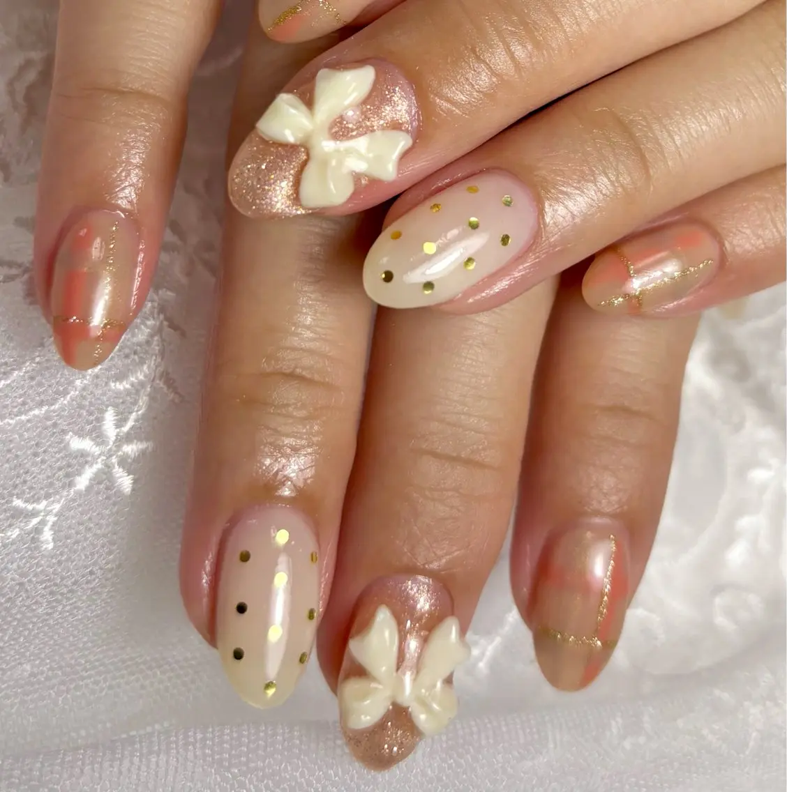 ネイル ニュアンスネイル リボン ワンホンネイル ハンドネイル Belle ネイル& ホワイトニングサロンのネイルデザイン