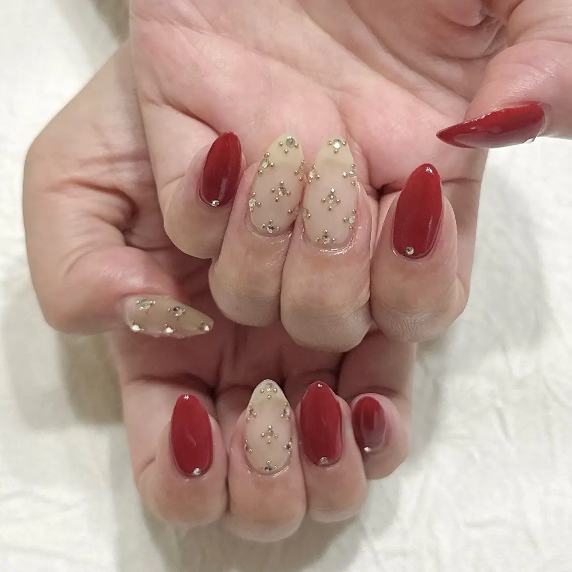 ネイル ボルドー ゴールド シルバー ストーンネイル ハンドネイル peaberry nailのネイルデザイン