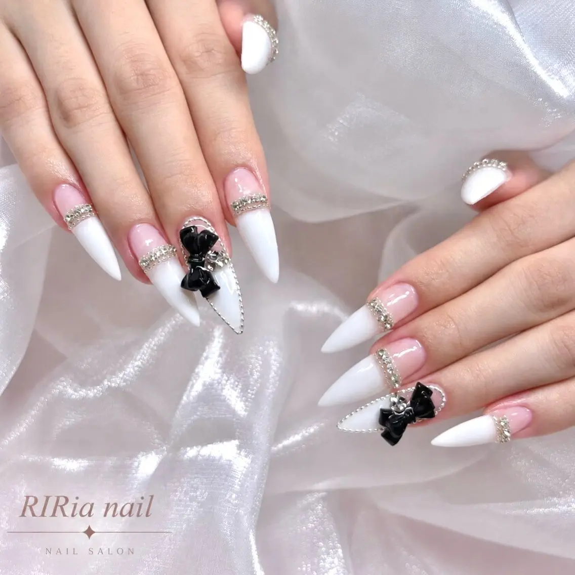 ネイル キラキラネイル ピンク リボン ストーンネイル ハンドネイル 🎀RIRia nail🎀のネイルデザイン