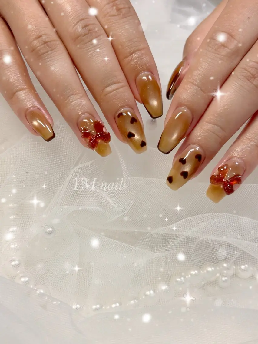 ネイル ブラウン ハート マグネットネイル リボン ハンドネイル YM nailのネイルデザイン