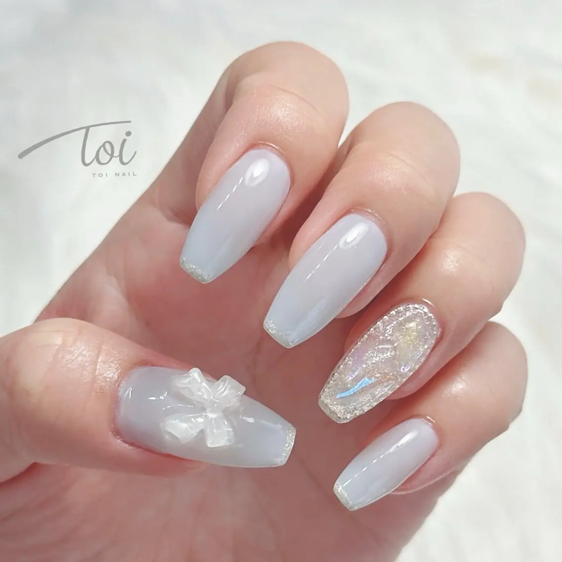 ネイル ブルー リボン ハンドネイル toi nailのネイルデザイン
