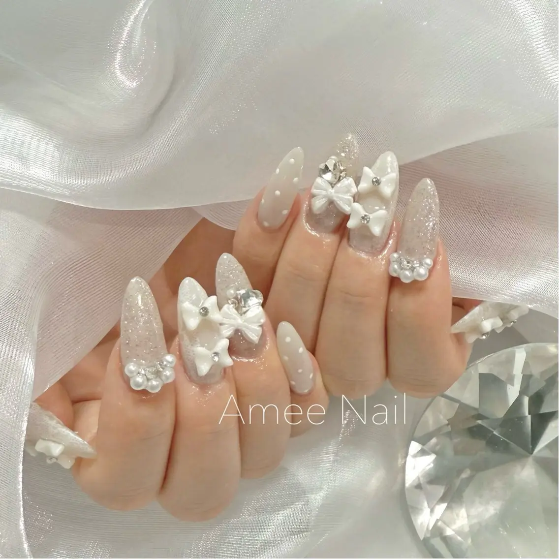 ネイル 成人式 ロングネイル マグネットネイル 大理石ネイル(マーブル) リボン ハンドネイル Amee Nail Salonのネイルデザイン