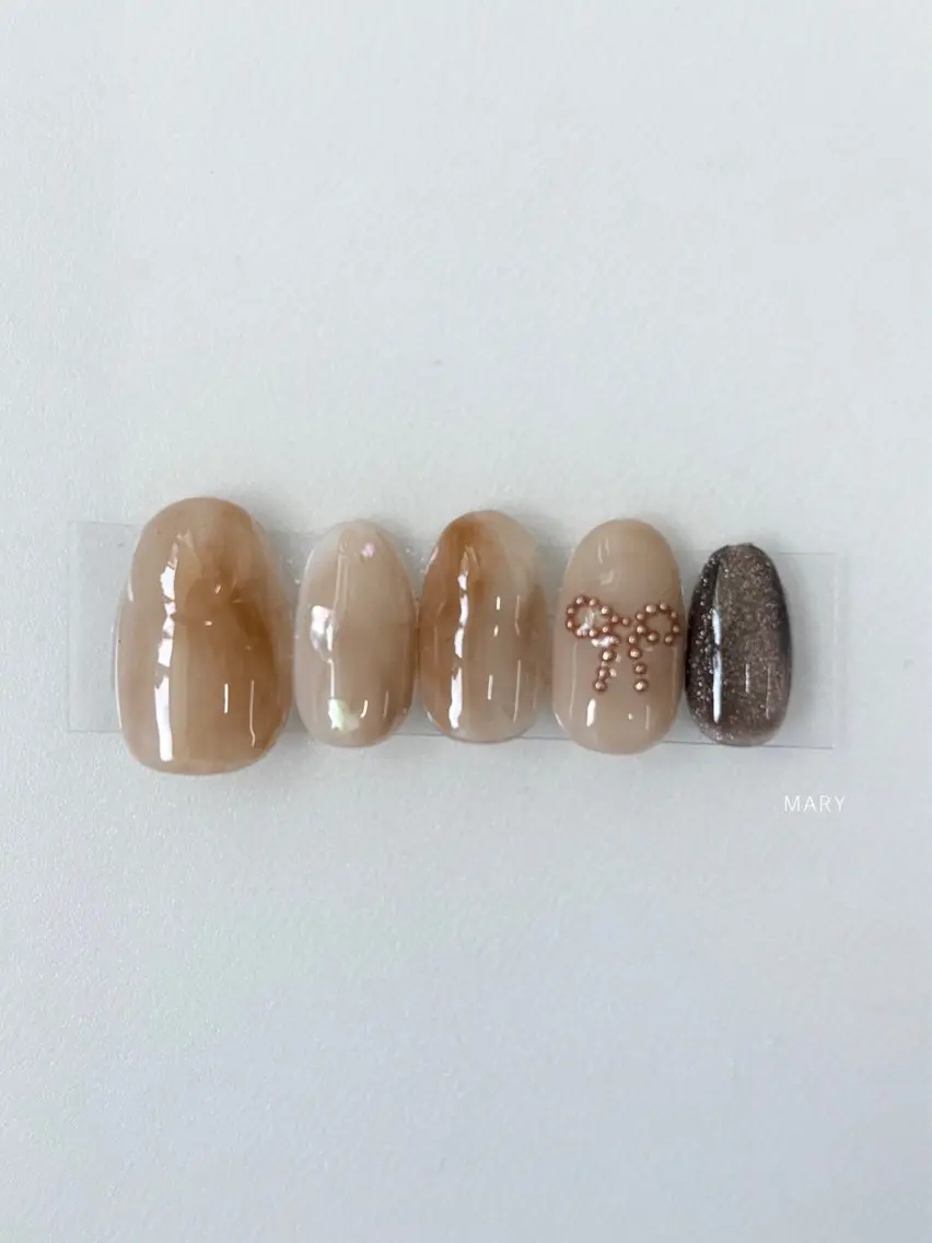 ネイル ブラウン ニュアンスネイル リボン ハンドネイル Mary nail .narumiのネイルデザイン