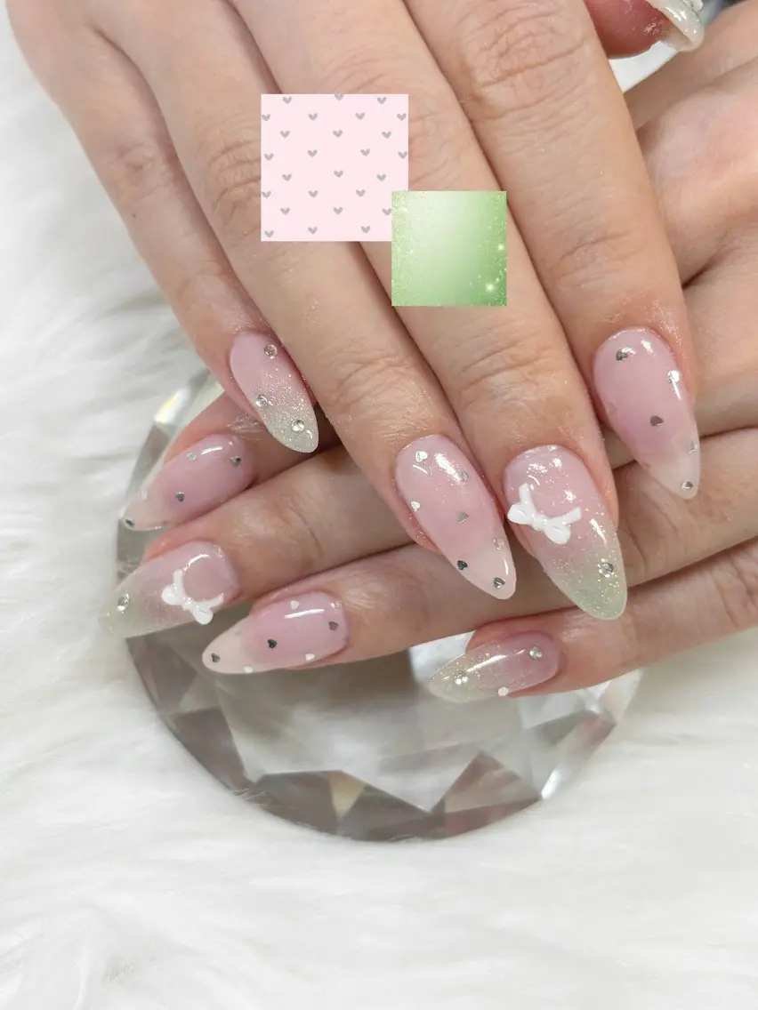 ネイル ガーリー ハート キラキラネイル ピンク リボン ハンドネイル YUUMI🫧 nailのネイルデザイン