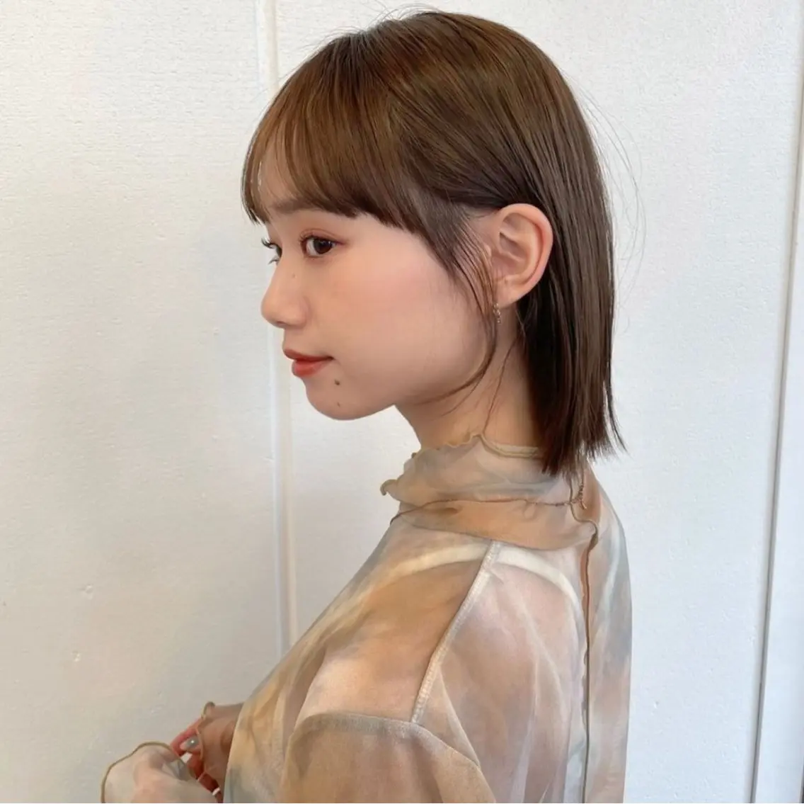 ショート ボブ ヘアカラー 顔まわりレイヤー 透明感カラー🩵🩵のヘアスタイル