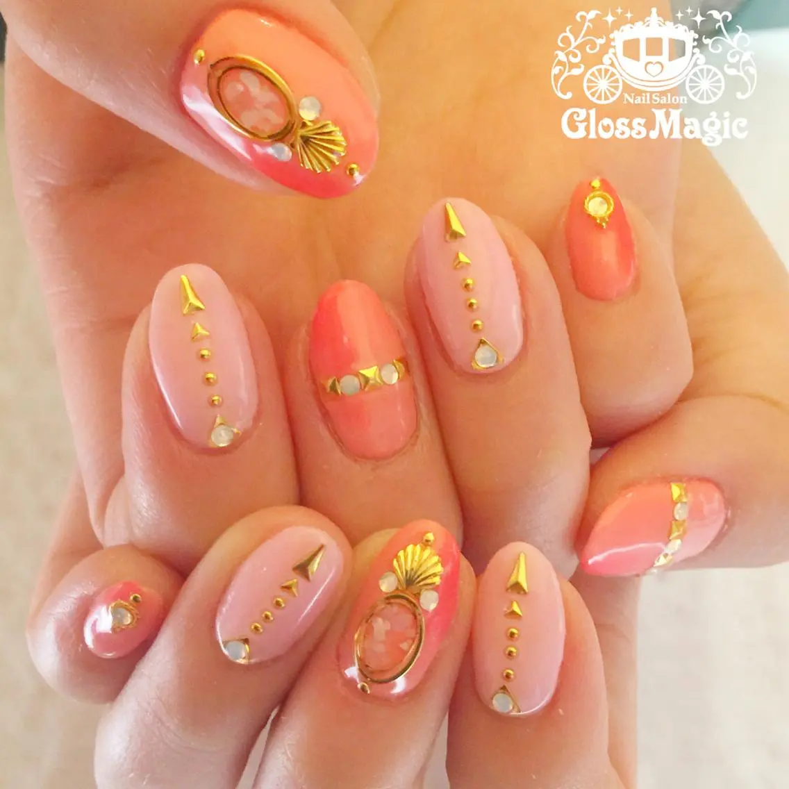 ネイル ジェルネイル オレンジ ピンク YUN 💅のネイルデザイン