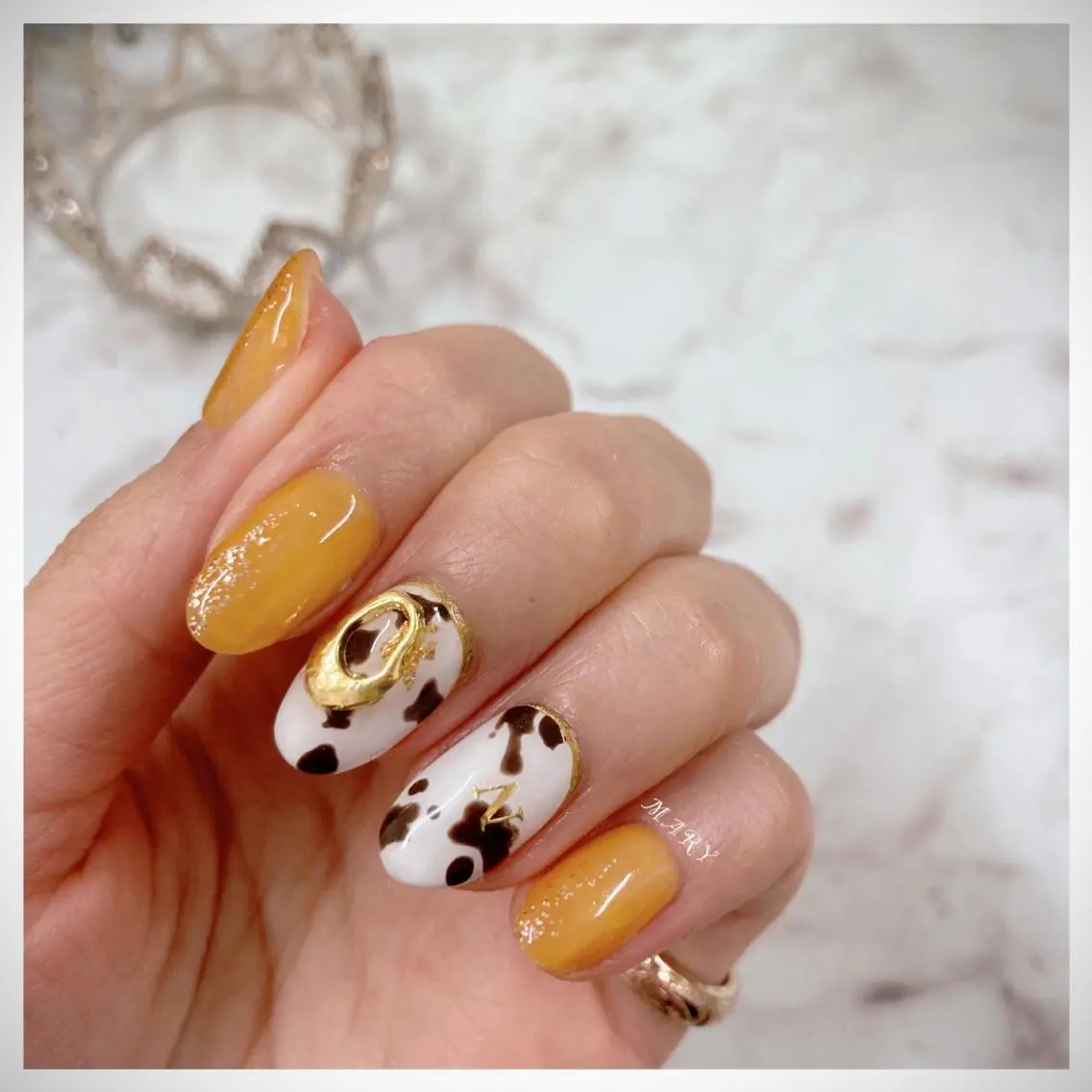 ネイル アニマル柄 アートネイル ニュアンスネイル ワンカラーネイル オレンジ ハンドネイル Mary nail .narumiのネイルデザイン
