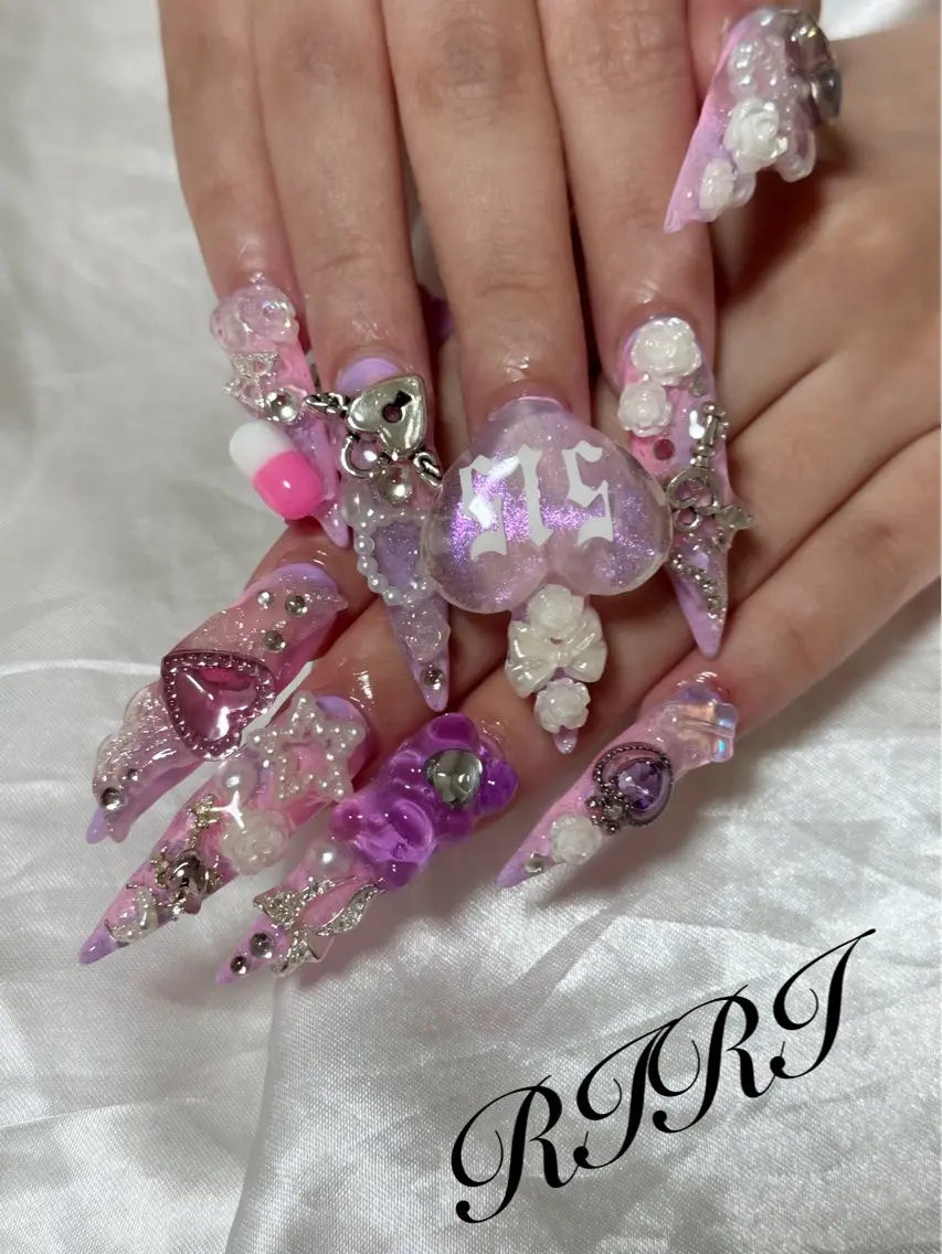ネイル フラッシュネイル ジェルネイル ロングネイル ピンク スカルプネイル ハンドネイル riri オーナーのネイルデザイン