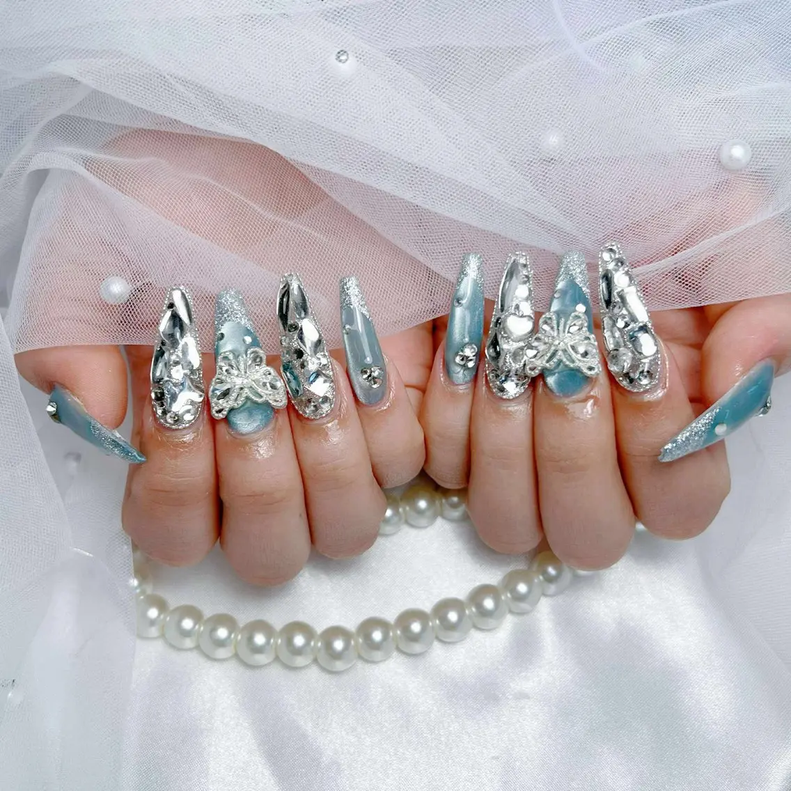 ネイル オーロラネイル ボルドー ブラウン ハート ラメ(グリッター) ハンドネイル Nova Nailのネイルデザイン