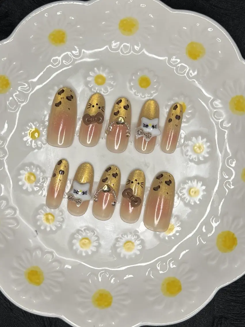 ネイル アニマル柄 ガーリー ゴールド リボン ハンドネイル RAFU・NAIL 名古屋栄のネイルデザイン