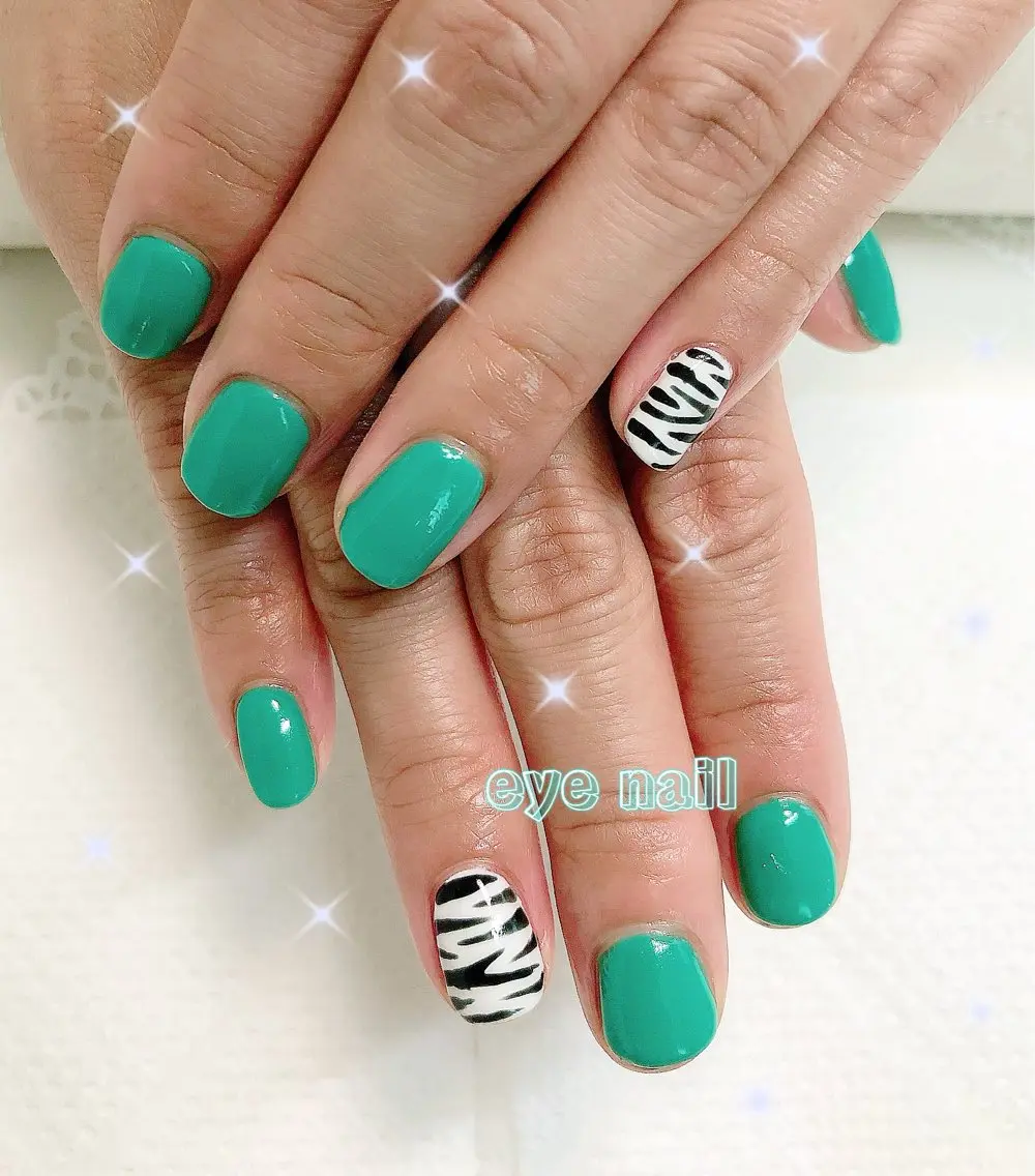 ネイル アニマル柄 グリーン ハンドネイル Eye nailのネイルデザイン