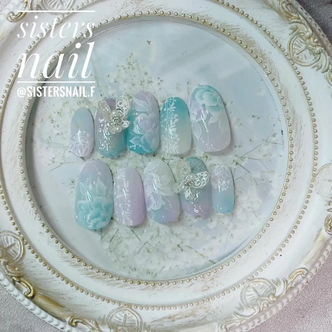 ネイル アートネイル 成人式 フラワーネイル グラデーション キラキラネイル sisters nail.fのネイルデザイン