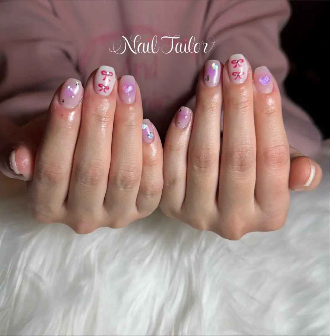 ネイル ガーリー ハート キラキラネイル ピンク リボン ハンドネイル NailTailor ネイルテイラーのネイルデザイン