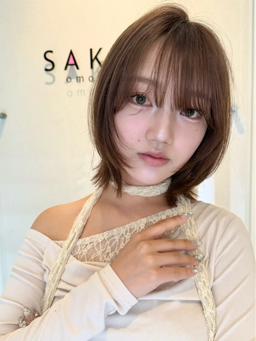 ショート 切りっぱなしボブ ボブレイヤー ボブ くびれヘア 顔まわりレイヤー カット ヘアカラー トリートメント SAKURA omotesandoのヘアスタイル