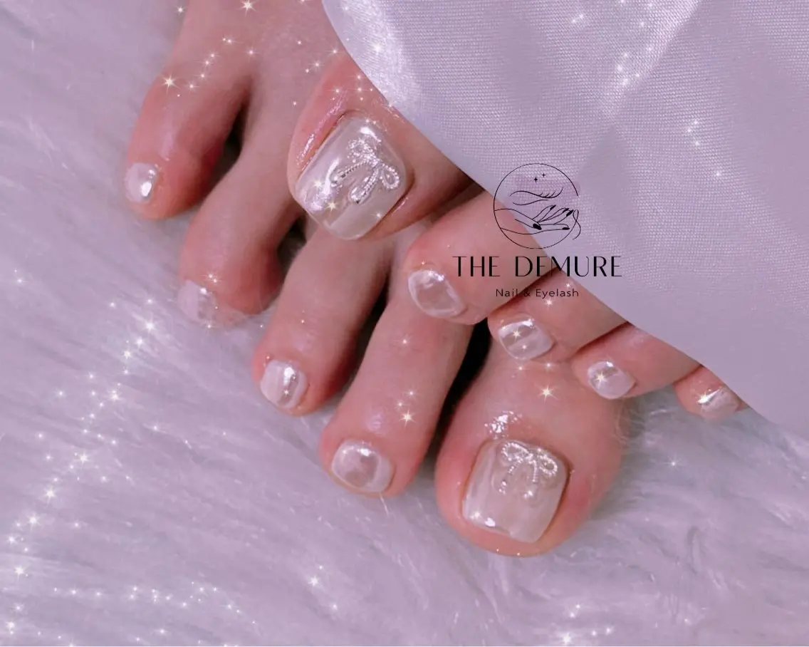 ネイル アートネイル フットネイル キラキラネイル 韓国ネイル 水色 フットネイル NailDemure 【銀座店】のネイルデザイン