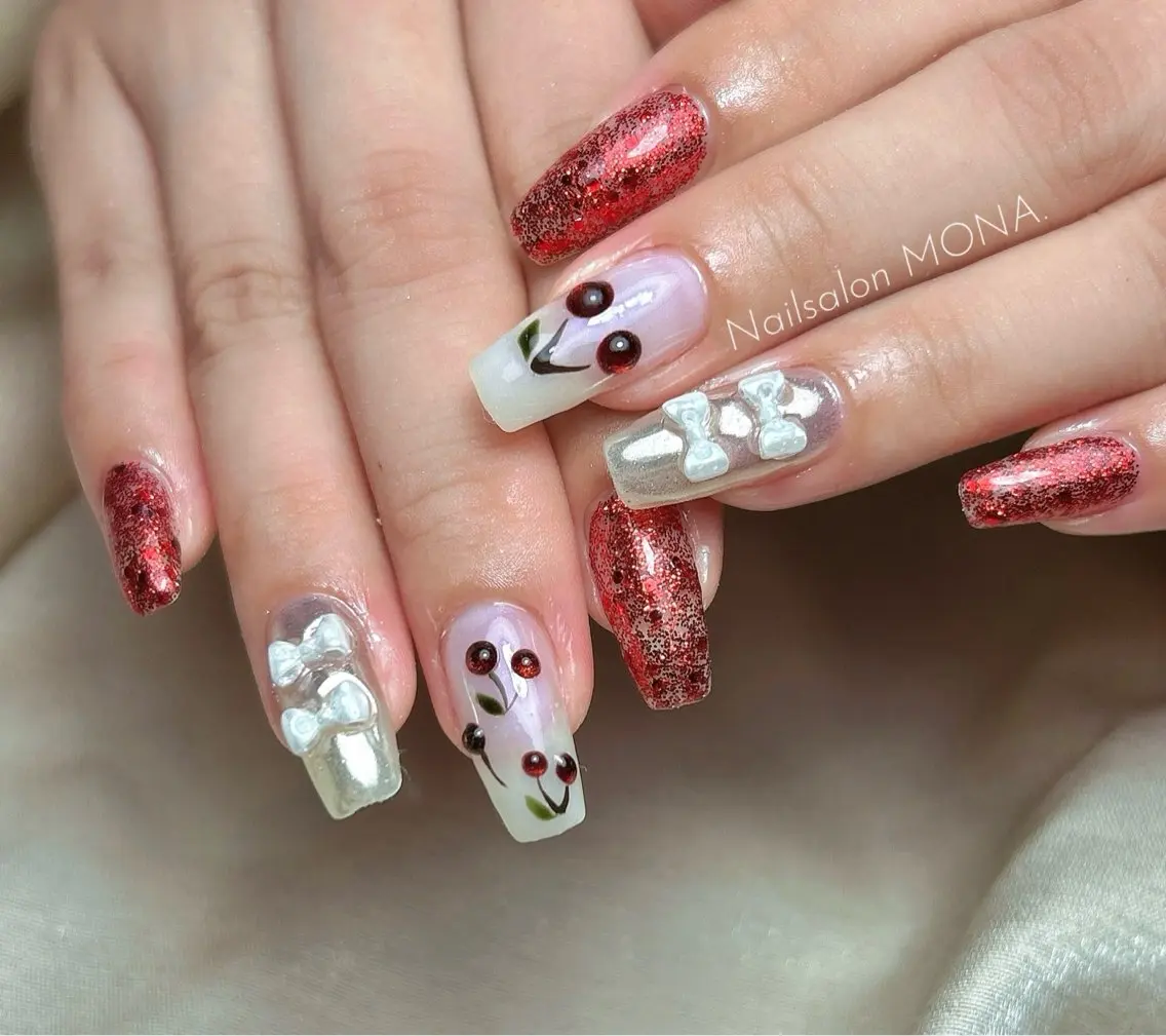 ネイル ラメ(グリッター) ワンカラーネイル 赤色 リボン ハンドネイル Nailsalon MONA.のネイルデザイン