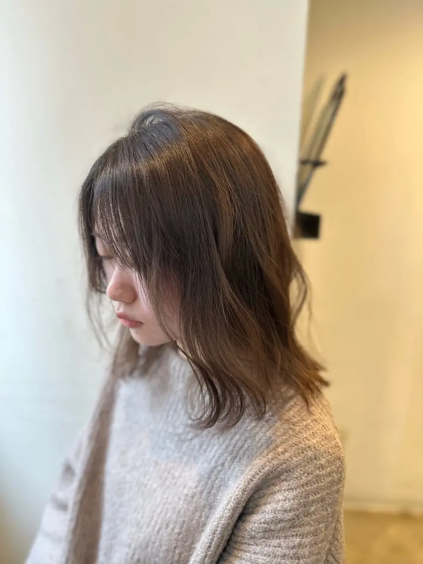 金 春江のヘアスタイル