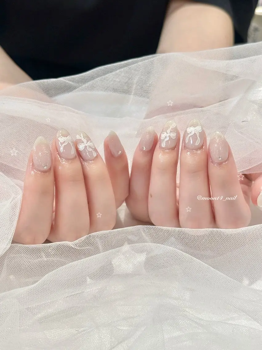 ネイル ジェルネイル キラキラネイル マグネットネイル パラジェル リボン ハンドネイル natsuki 💫のネイルデザイン
