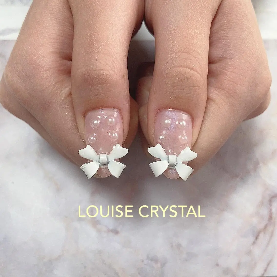 ネイル ハンドネイル LOUISE CRYSTALのネイルデザイン