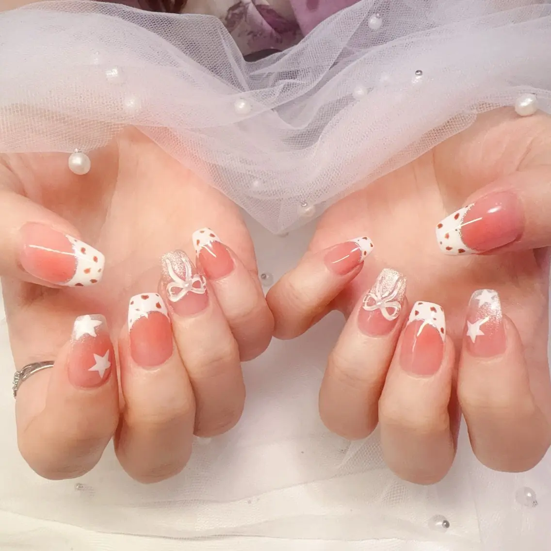 ネイル オーロラネイル チークネイル 桜ネイル 長さ出し ジェルネイル ハンドネイル YUYI.nail salonのネイルデザイン