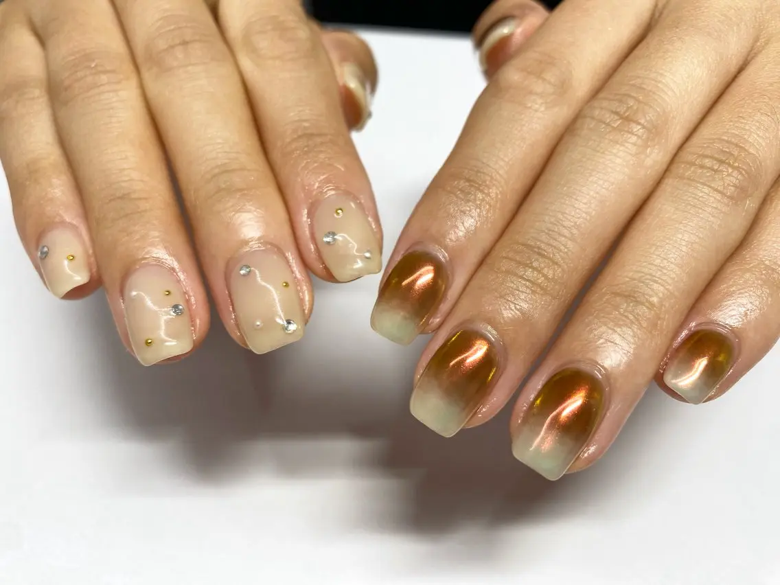 ネイル ブラウン クリアネイル キラキラネイル ストーンネイル ハンドネイル 表参道colore店 REICAのネイルデザイン