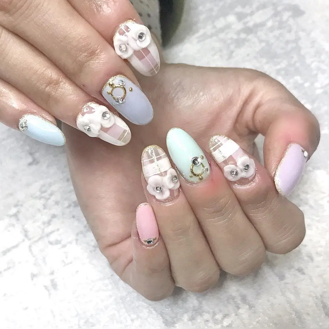 ネイル フラワーネイル ワンカラーネイル パステルネイル 春ネイル ステラ marikominoのネイルデザイン