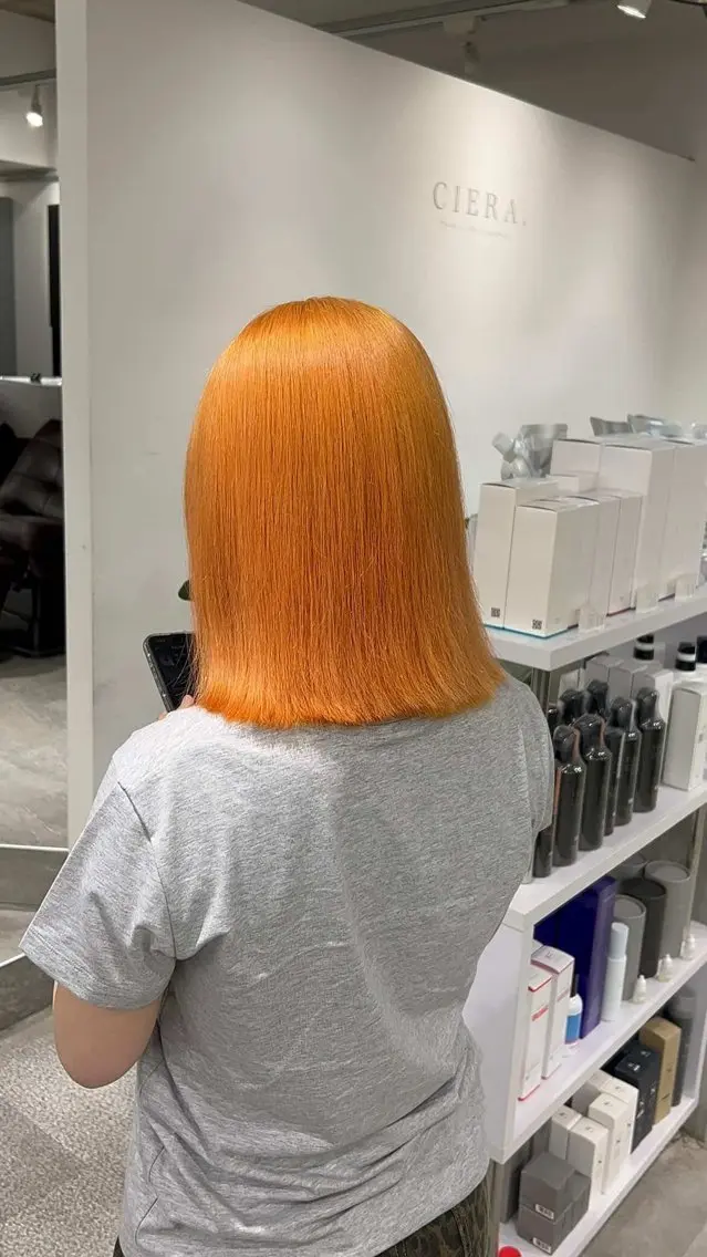 ミディアム カラー ブリーチ デザインカラー ハイトーンカラー オレンジ ボブ ヘアカラー 蔵本 仁のヘアスタイル
