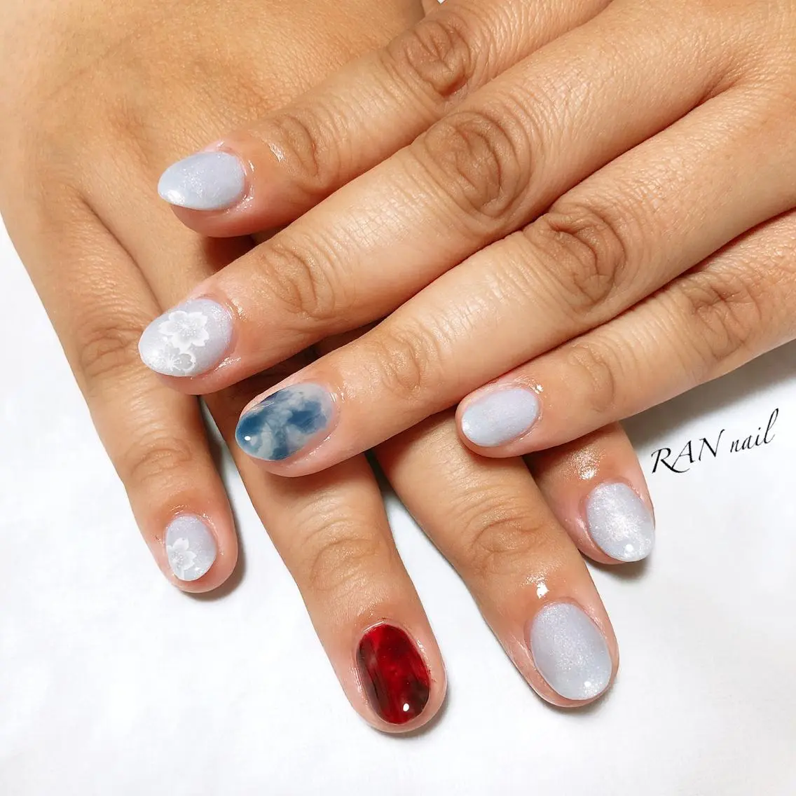 ネイル 桜ネイル 水色 春ネイル ハンドネイル フットネイル RAN nailのネイルデザイン