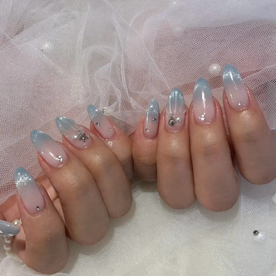 セミロング ハンドネイル SHELL NAIL 🐰ｎｏａ🐶のネイルデザイン