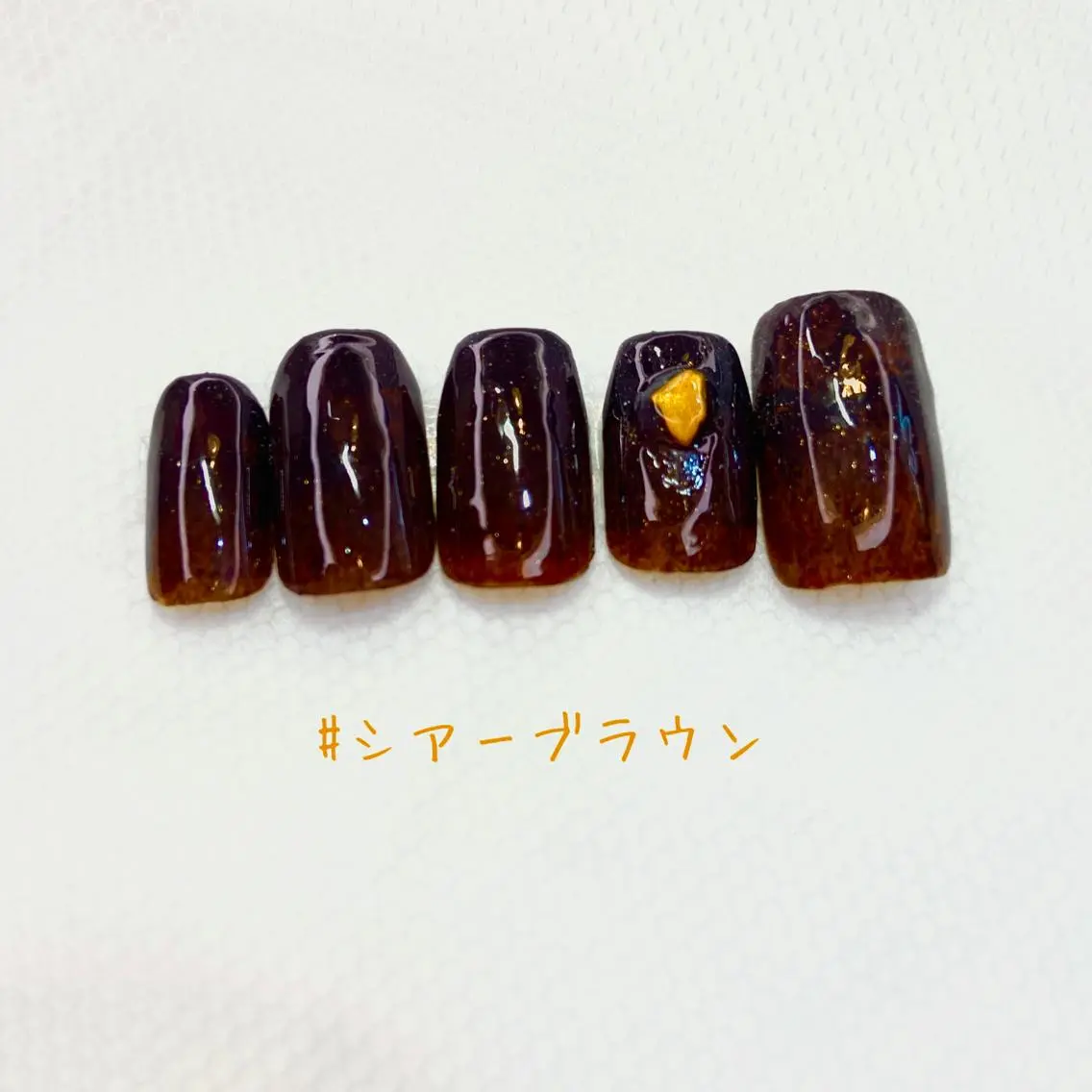 ネイル ブラウン ゴールド nailbios .tomo.のネイルデザイン