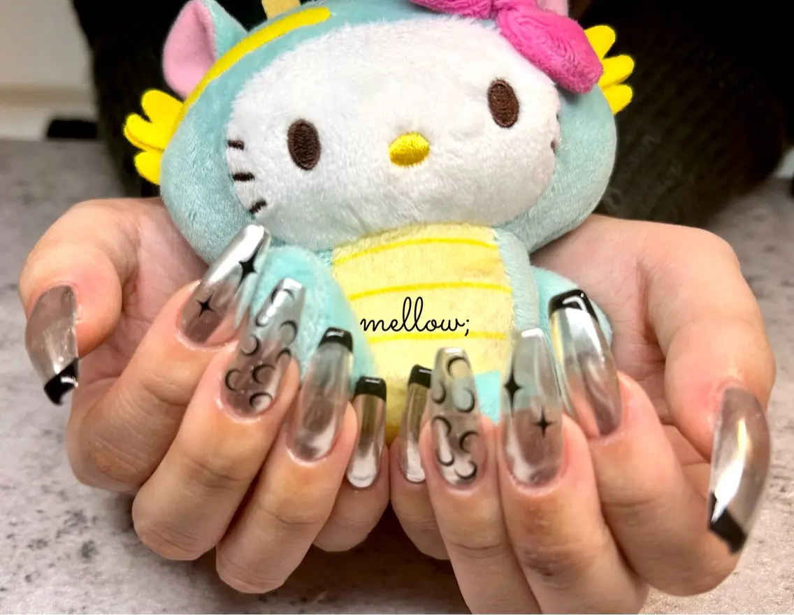 ネイル mellow:ｸﾙﾐ ﹡˖˟༝🎀˖˟ ༝のネイルデザイン