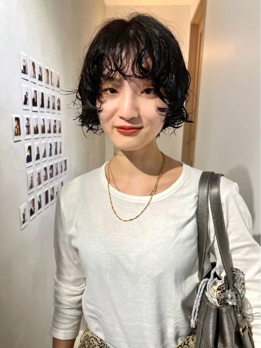 ショート パーマ 飯田 優恵のヘアスタイル