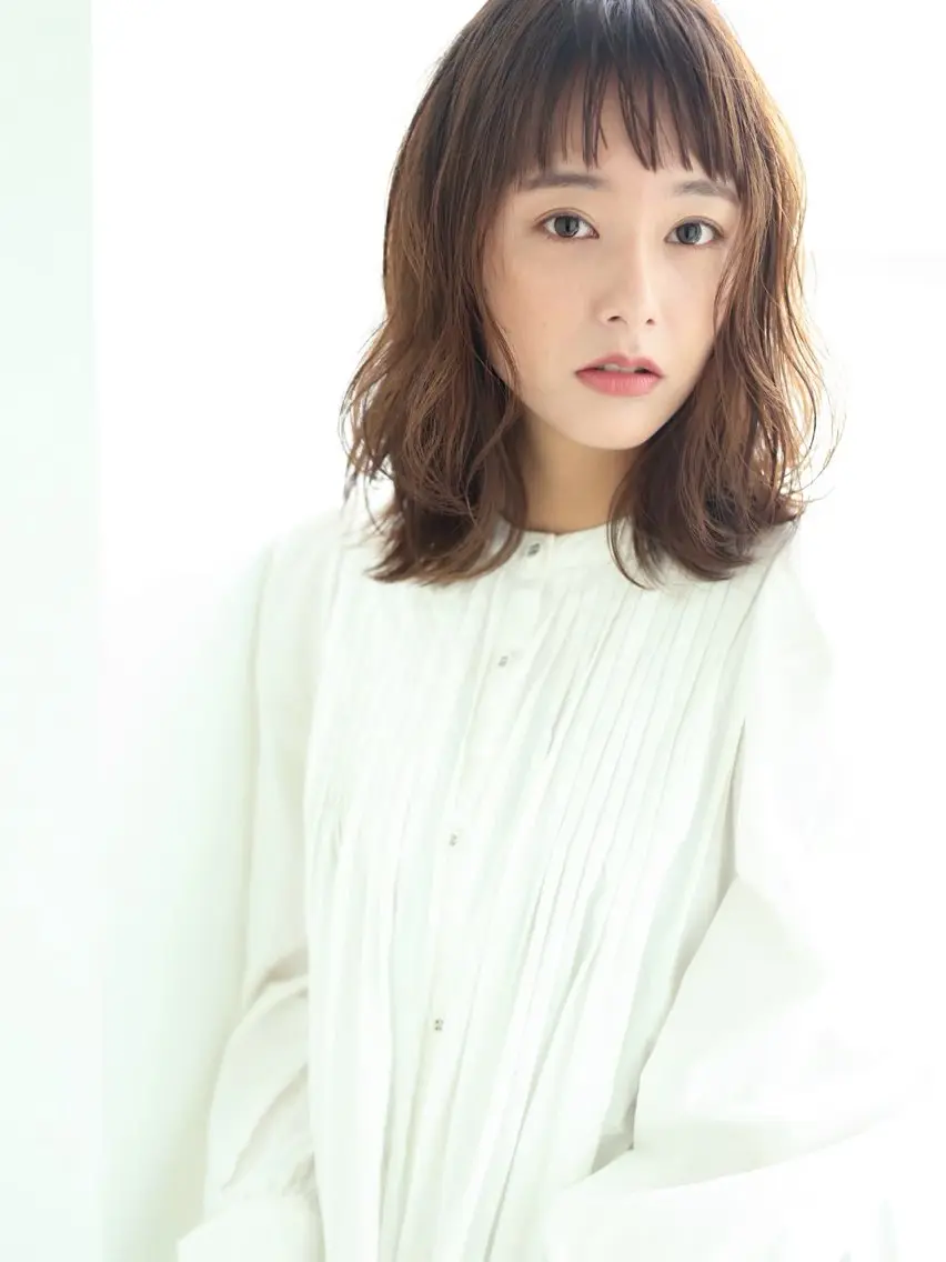 ミディアム ミディアムパーマ inity　杉本 美羽のヘアスタイル