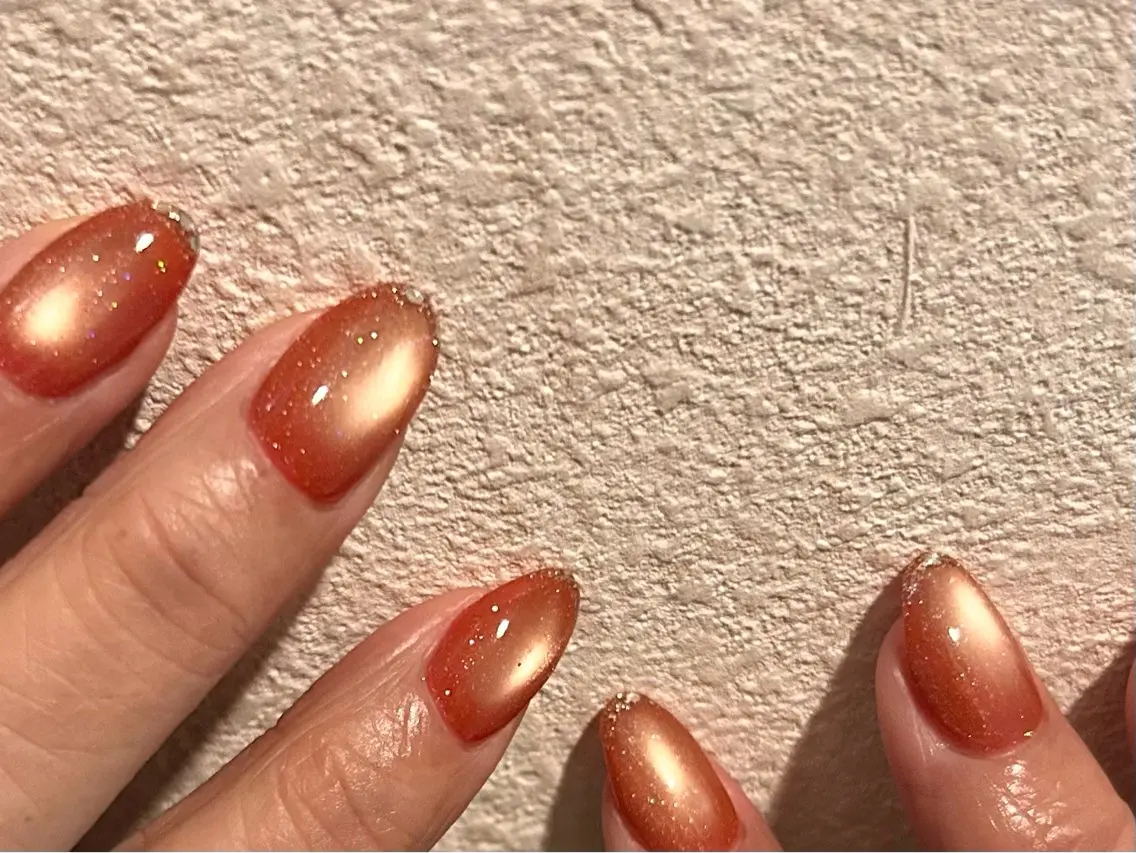 ネイル キラキラネイル マグネットネイル オレンジ Re HEURのネイルデザイン